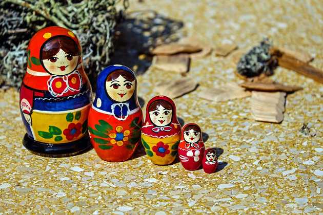 Photo of stacking dolls lined up next to each other